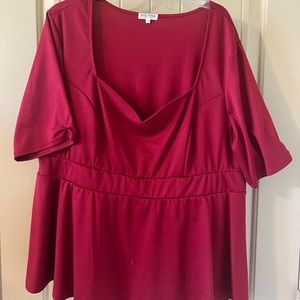 Kyonna brand size 3 peplum top with sweet-heart neck line.